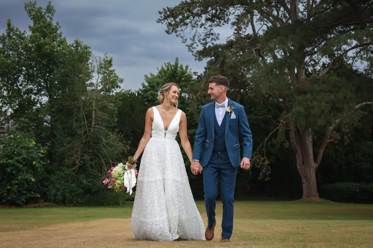 Bride and groom portrait by Studio H Photography