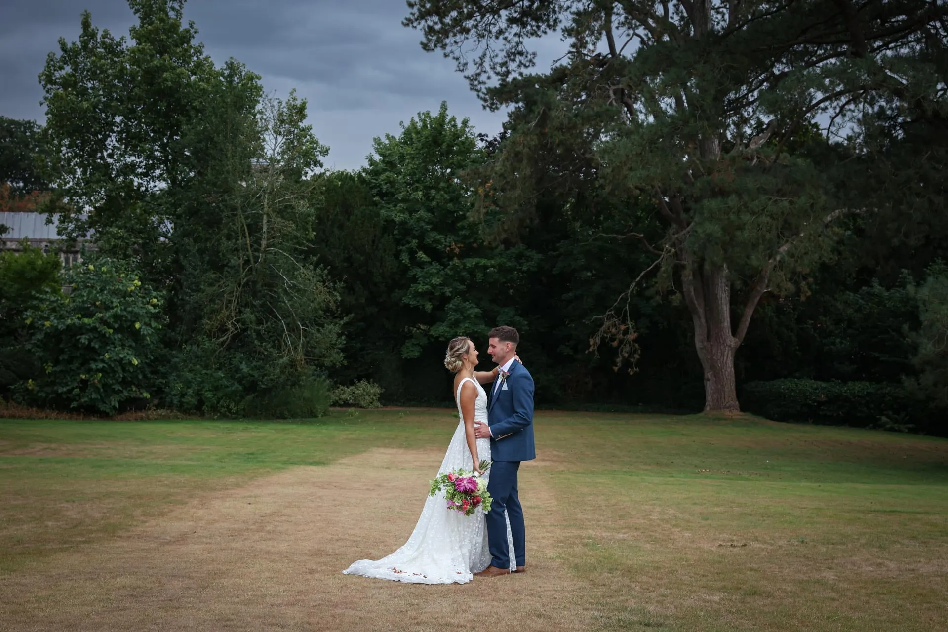 Bride and groom portrait by Studio H Photography