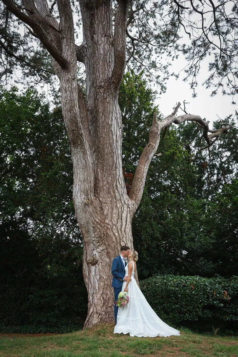 Bride and groom portrait by Studio H Photography
