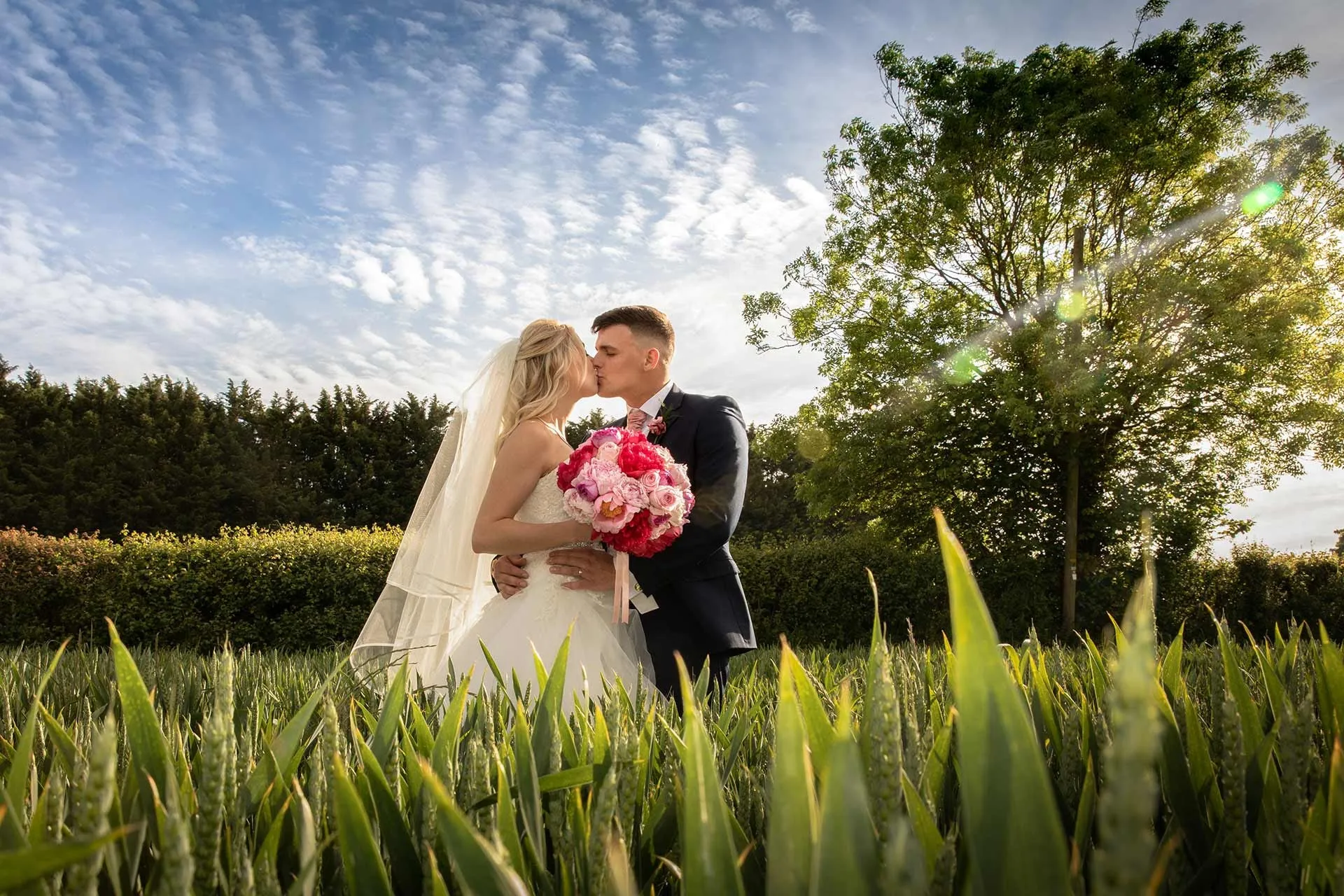 Bride and groom portrait by Studio H Photography