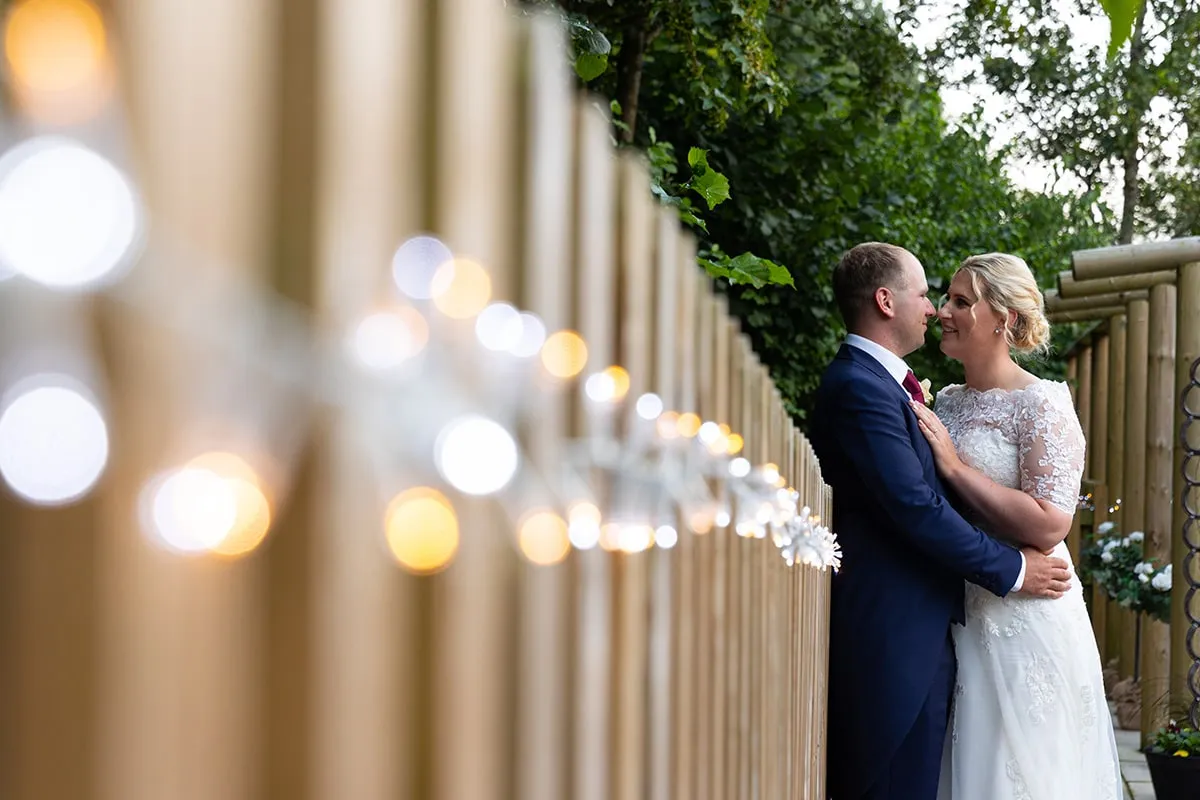 Bride and groom portrait by Studio H Photography