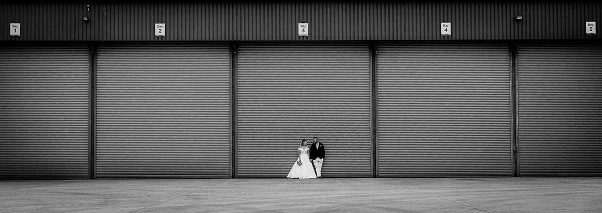 Bride and groom portrait by Studio H Photography