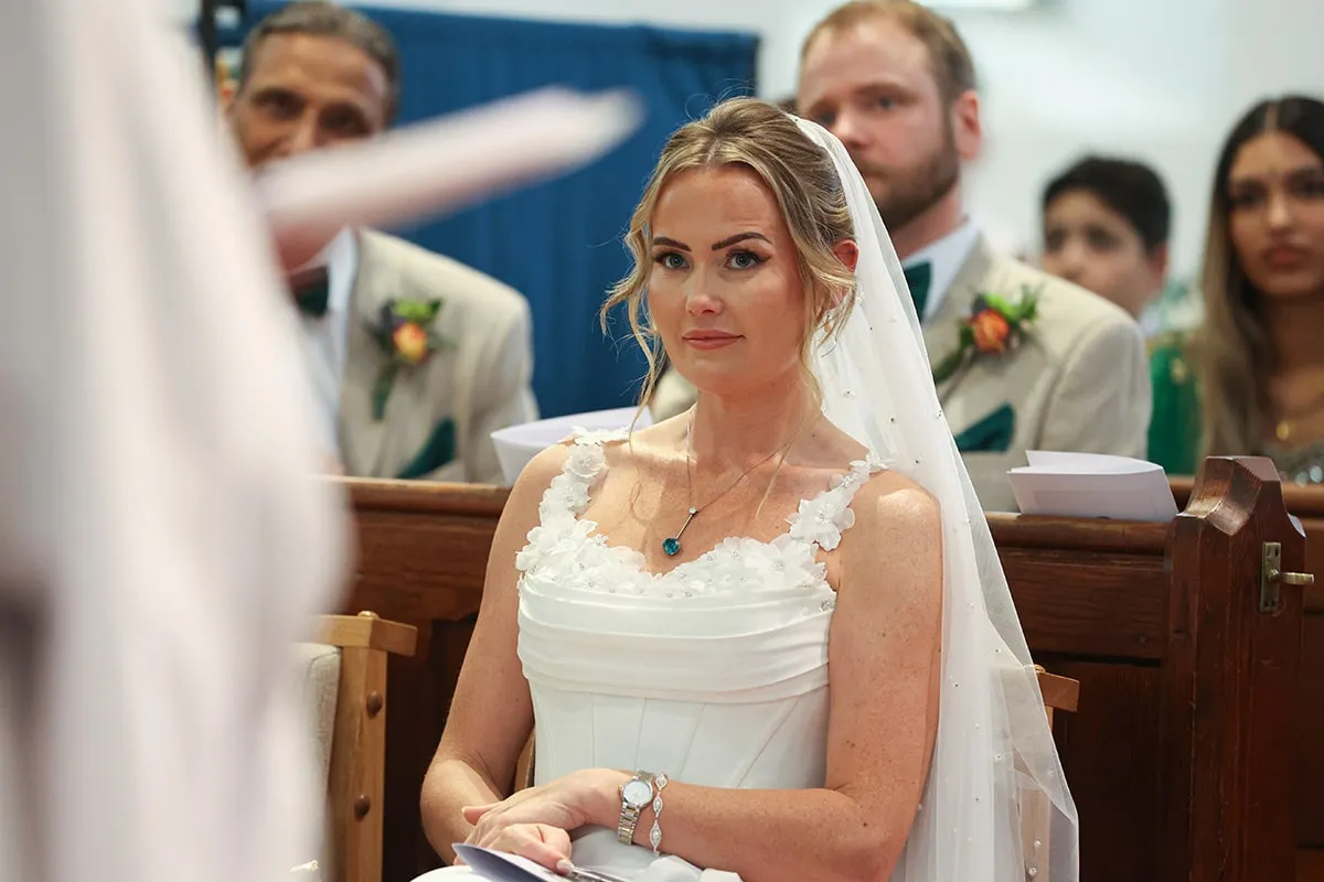 Bride laughing during the ceremony
