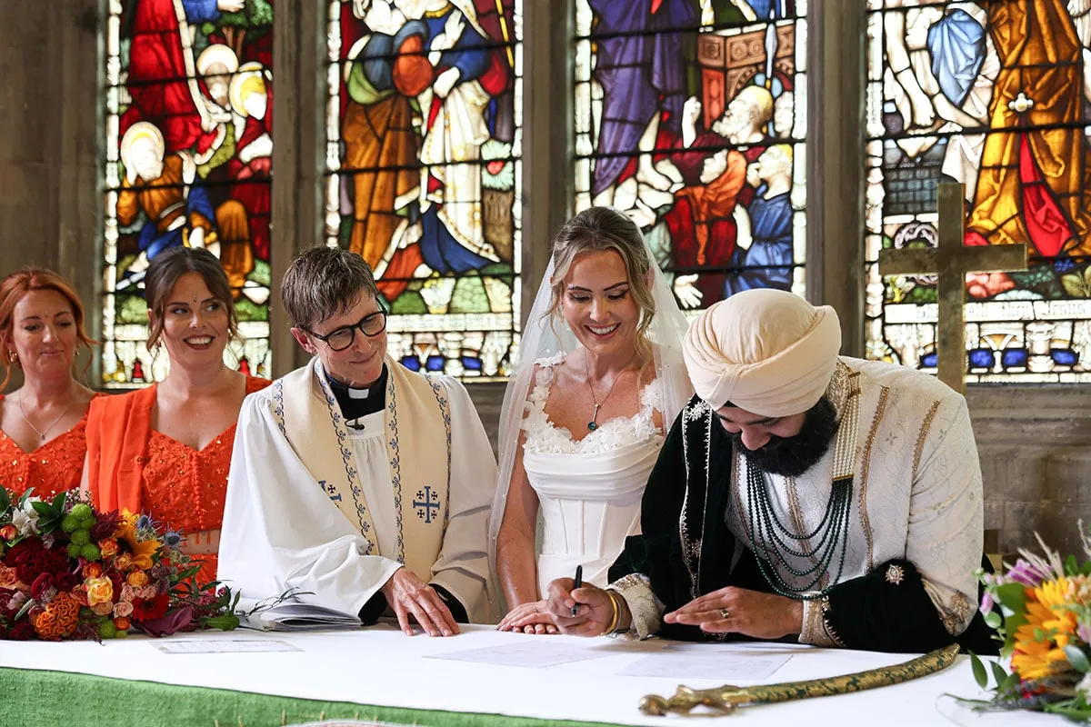 Signing the register after the ceremony