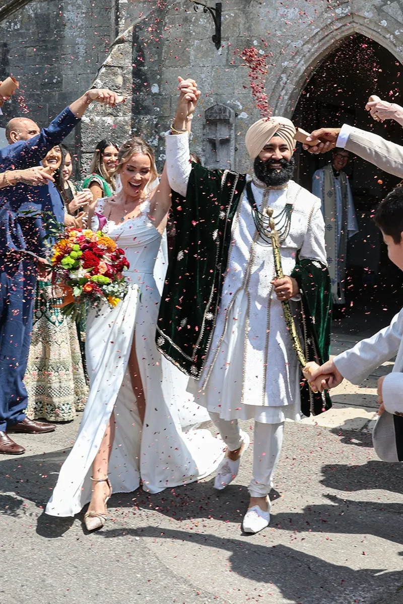 Confetti moment at a multicultural wedding celebration