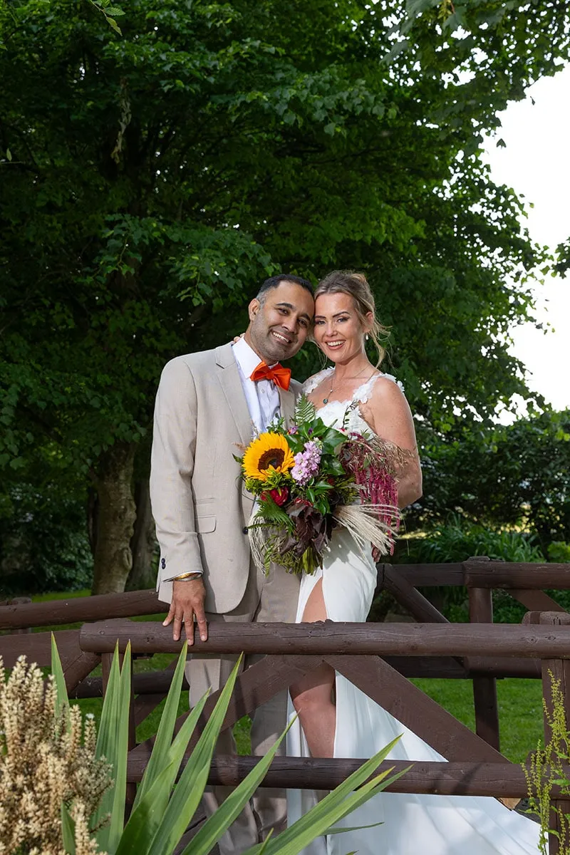 Bride and groom portrait by Studio H Photography