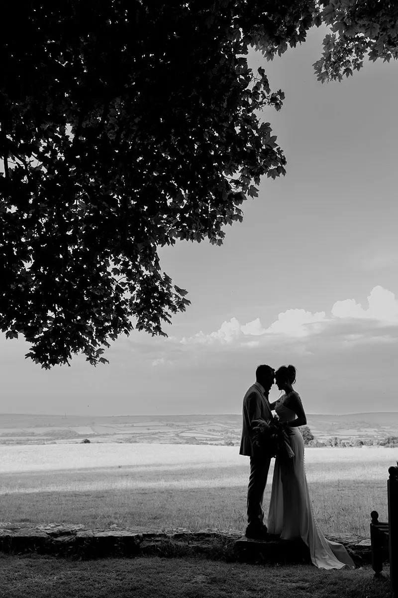 Bride and groom portrait by Studio H Photography