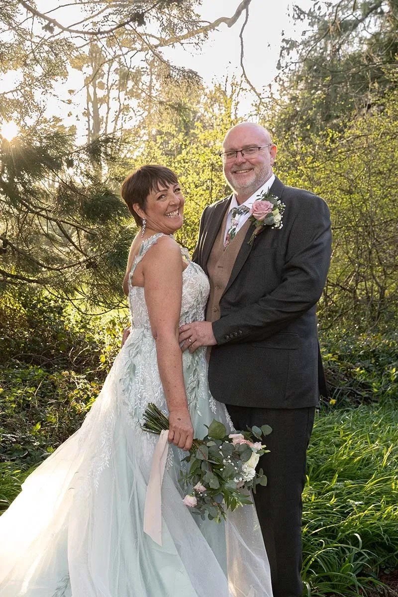 Bride and groom portrait by Studio H Photography