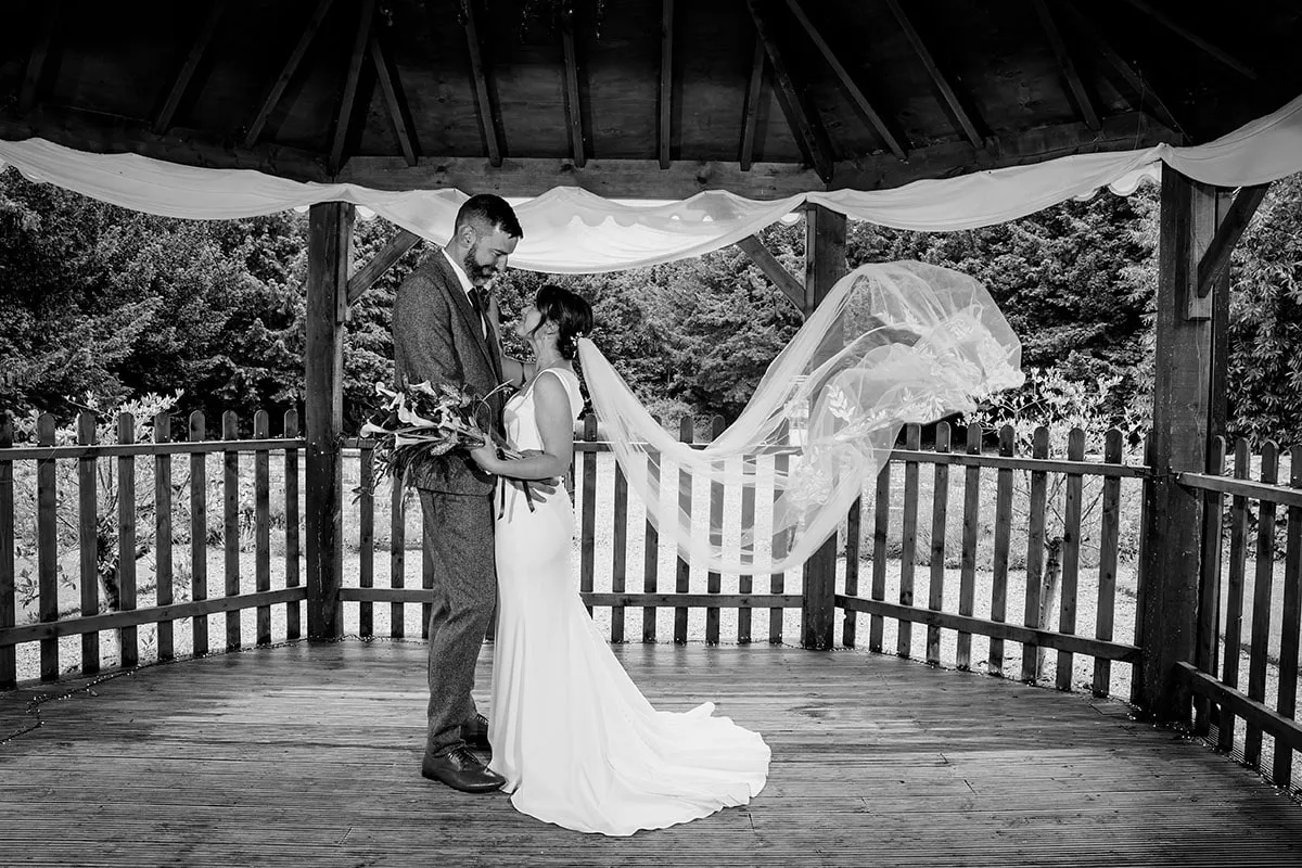 Bride and groom portrait by Studio H Photography