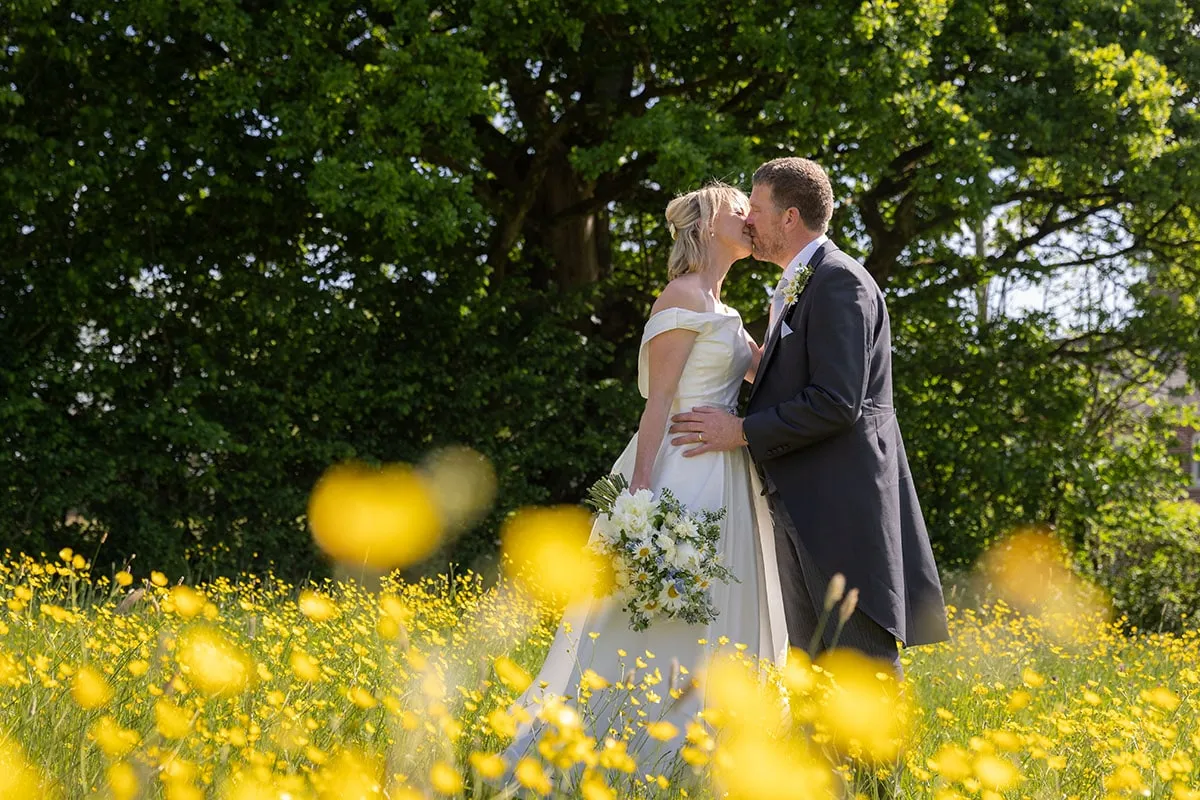 Bride and groom portrait by Studio H Photography