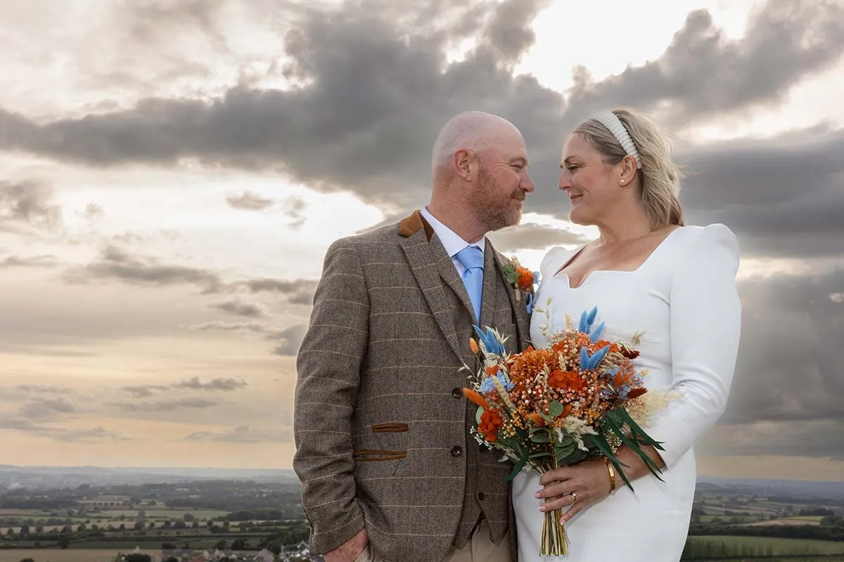 Bride and groom portrait by Studio H Photography