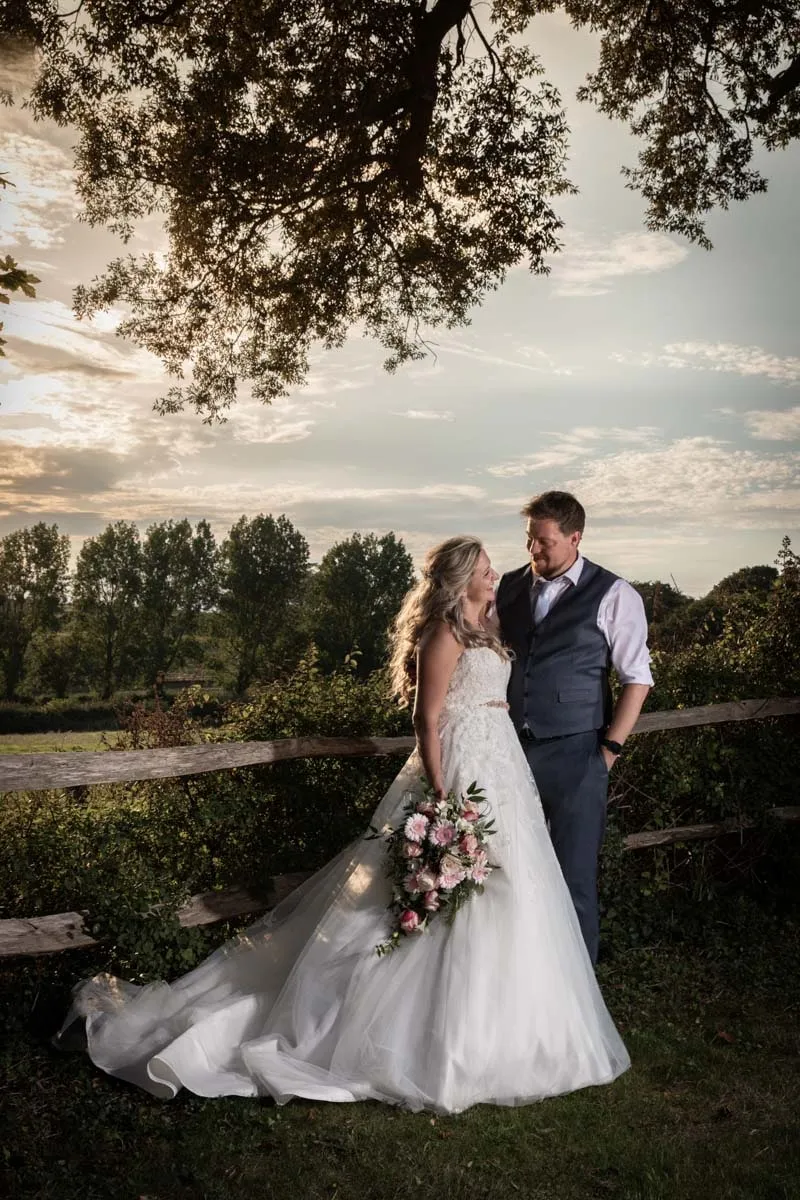 Bride and groom portrait by Studio H Photography