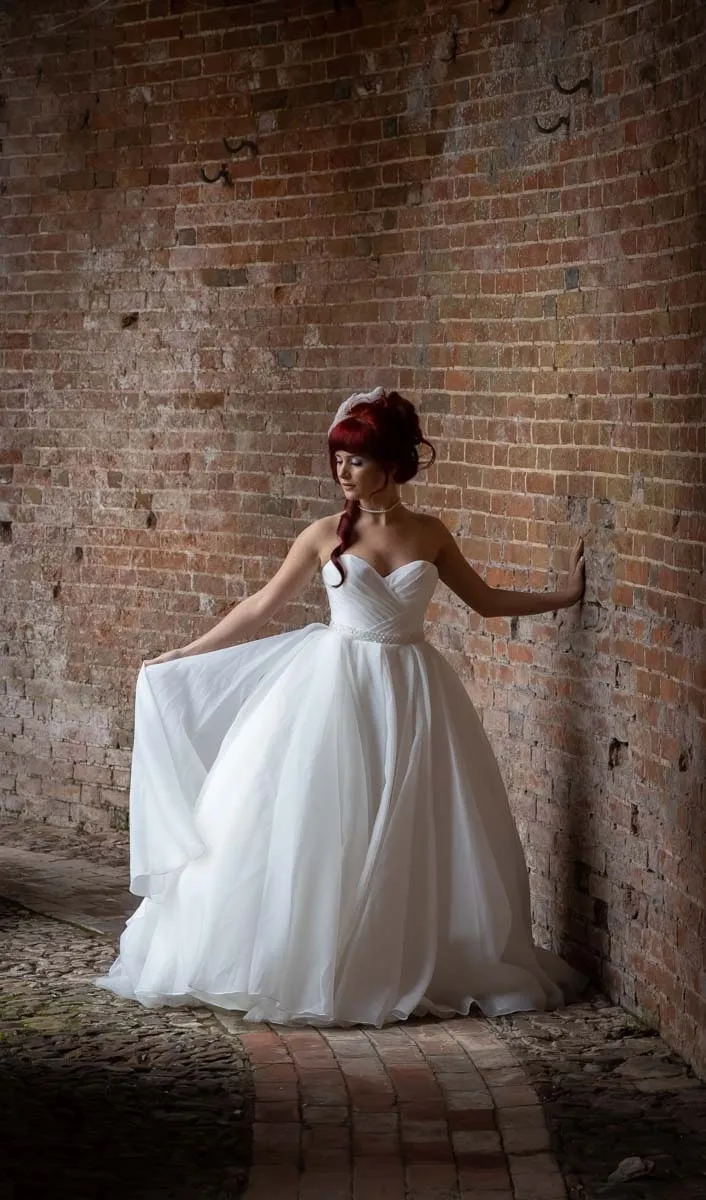 Bride and groom portrait by Studio H Photography