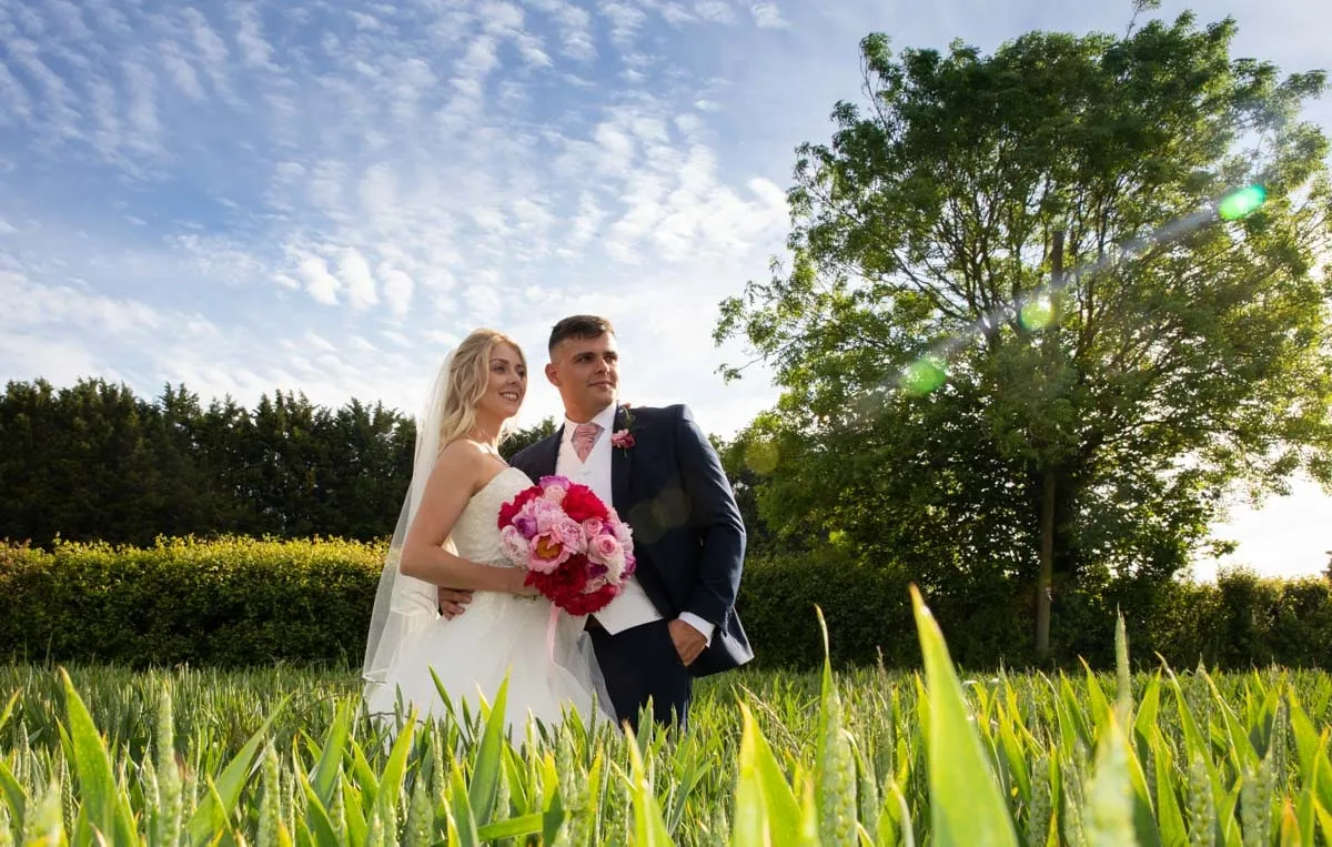 Bride and groom portrait by Studio H Photography