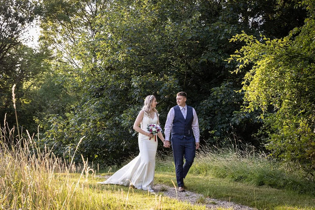 Bride and groom portrait by Studio H Photography