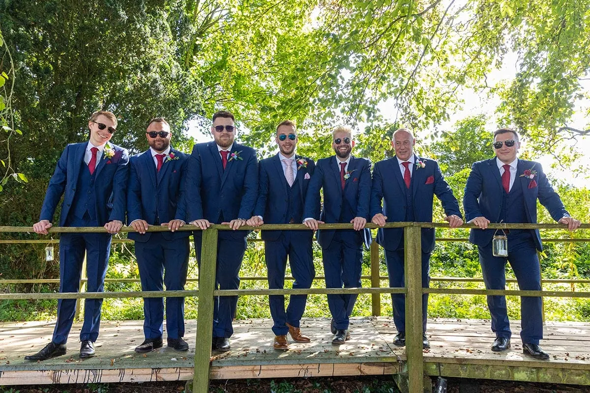 Groomsmen photographed together at the venue