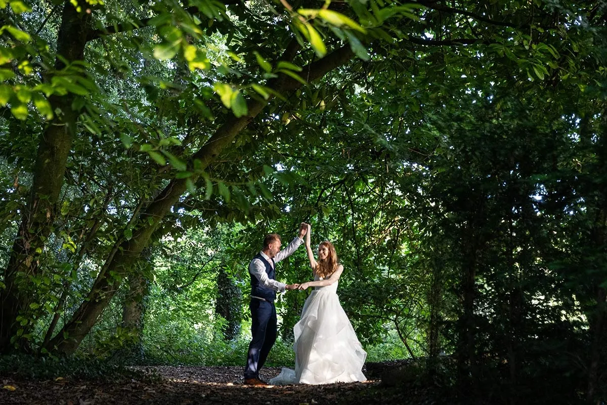 Bride and groom portrait by Studio H Photography