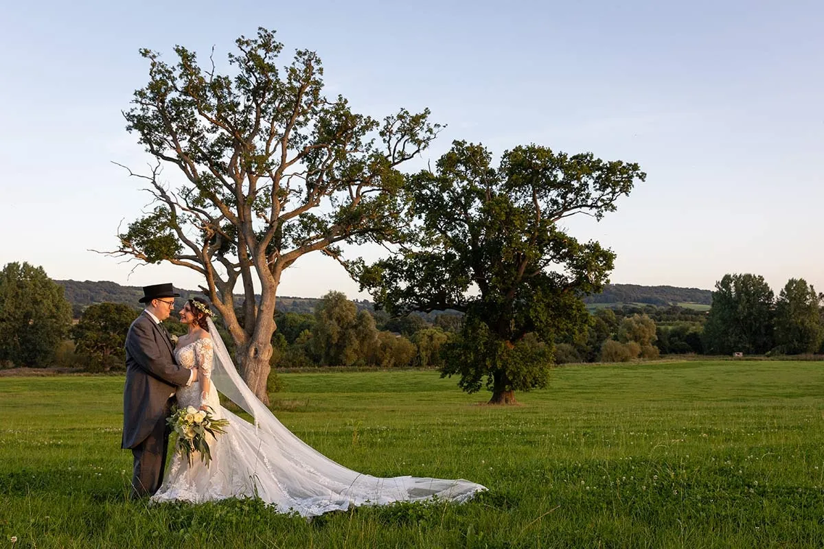 Bride and groom portrait by Studio H Photography