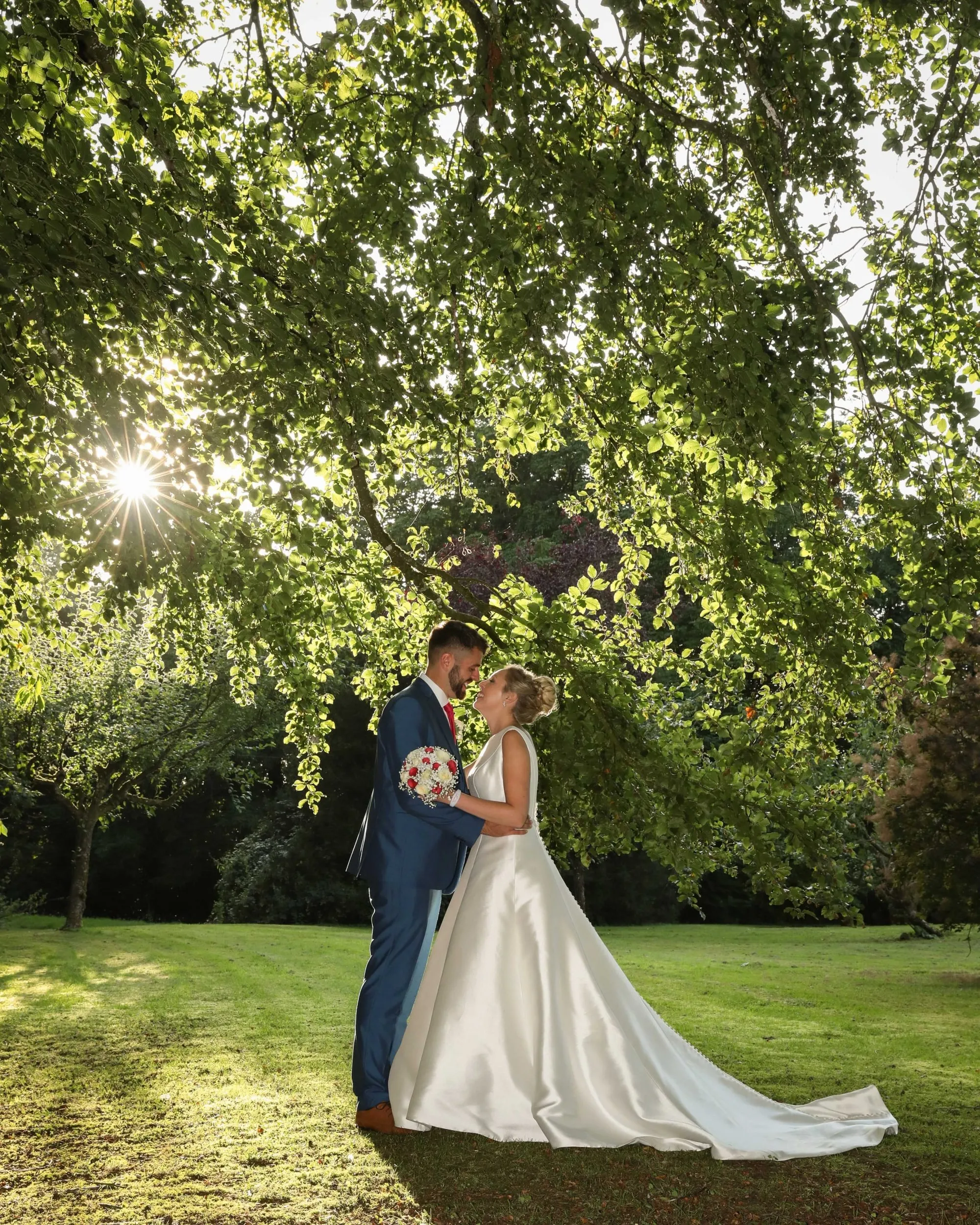 Bride and groom portrait by Studio H Photography